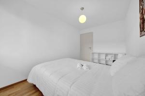 Postel nebo postele na pokoji v ubytování PEARL07 Appartement lumineux 2G