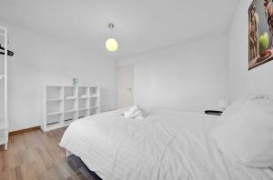 Postel nebo postele na pokoji v ubytování PEARL07 Appartement lumineux 2G