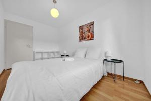 Postel nebo postele na pokoji v ubytování PEARL07 Appartement lumineux 2G