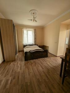 Postel nebo postele na pokoji v ubytování Rima's house Jervezh