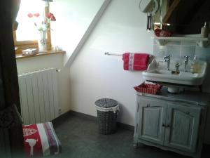 a bathroom with a sink and a sink at Domaine de Collen in Lépine +31 photos