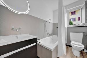 Koupelna v ubytování PEARL06 Appartement cosy près de Bienne 1D + 50 fotografií