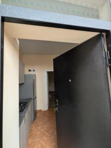 Kuchyň nebo kuchyňský kout v ubytování Rima's house Jervezh