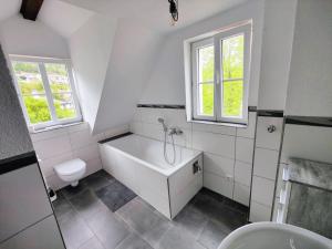 Koupelna v ubytování Malerisches Apartment am Kirchplatz + 14 fotografií