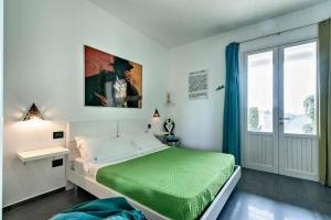 Postel nebo postele na pokoji v ubytování Bed & Blues