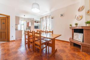 Η κουζίνα ή μικρή κουζίνα στο AffittaSardegna - Quadri Tramonto +21 φωτογραφίες