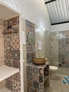 Ένα μπάνιο στο Cabañas Villa del Prado