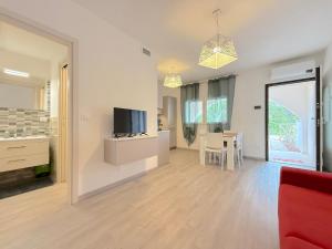 TV a/nebo společenská místnost v ubytování Gatto Marino Apartment