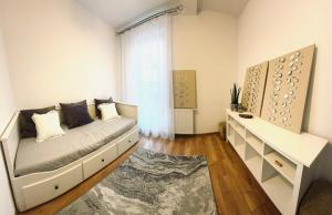 Postel nebo postele na pokoji v ubytování Cozy Corner Warmińska