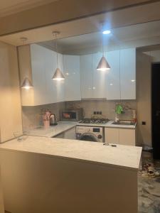 Kuchyň nebo kuchyňský kout v ubytování Vitali Apartment