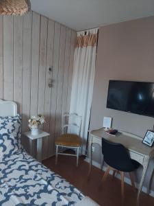 Postel nebo postele na pokoji v ubytování Chambres d'Hotes des Ecureuils
