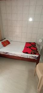 Postel nebo postele na pokoji v ubytování Nakshatra Homestay
