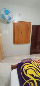 Postel nebo postele na pokoji v ubytování Nakshatra Homestay