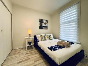 Krevet ili kreveti u jedinici u okviru objekta Sleek And Comfortable Space