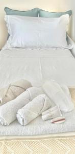 Ένα ή περισσότερα κρεβάτια σε δωμάτιο στο onde dell'etna 12