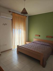 Voodi või voodid majutusasutuse Hotel La Filadelfia toas