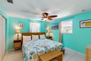 Giường trong phòng chung tại Getaway on Gladiolus +24 ảnh