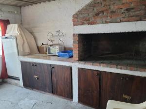 Η κουζίνα ή μικρή κουζίνα στο Casita con barbacoa en bello horizonte dpto de canelones +3 φωτογραφίες