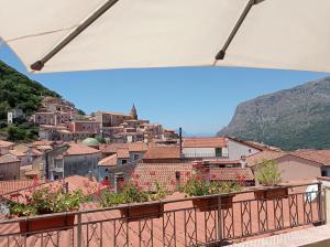 a view of a city from a balcony at Blasu Home in Maratea