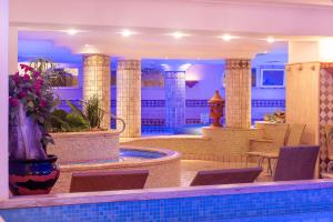 Hotel Terme Tritone Resort & Spa的休息区