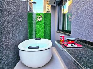 Foto de Casa 184 NOVA c banheira prox Cataratas e Argenti