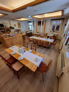 an overhead view of a restaurant with tables and chairs at Landhotel Solmser Hof GbR in Echzell