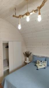 Postel nebo postele na pokoji v ubytování Camping Luni