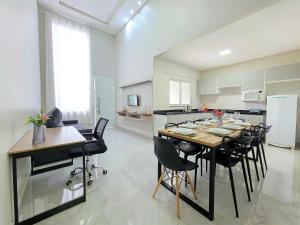 Foto de Casa 256 NOVA 10 min Cataratas jacuzzi 3 Quartos