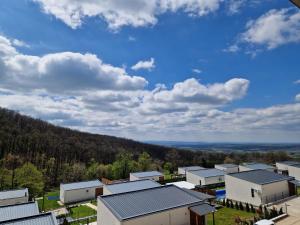 an aerial view of a cluster of buildings and trees at Kosmaj Renew - Sunset View in Koraćica