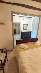 A bed or beds in a room at Ca La Palmira