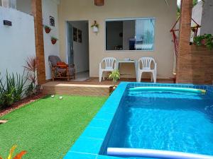 Hồ bơi trong/gần Casa Aconchego de Jacuípe, Ar condicionado e Piscina Privativa