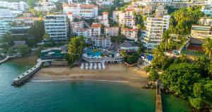 an aerial view of a beach in a city at Park Royal Beach Acapulco - All Inclusive in Acapulco +15 photos
