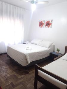 Ένα ή περισσότερα κρεβάτια σε δωμάτιο στο Oceano Hotel +12 φωτογραφίες