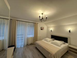 Φωτογραφία από το άλμπουμ του Căsuța de lângă izvor σε Moieciu de Sus