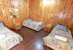 Postel nebo postele na pokoji v ubytování Hotel Catripulli