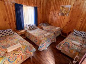 Postel nebo postele na pokoji v ubytování Hotel Catripulli