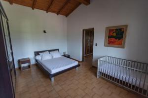 Ένα ή περισσότερα κρεβάτια σε δωμάτιο στο Casa Maredda with private pool and large garden +18 φωτογραφίες