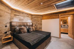 Ένα ή περισσότερα κρεβάτια σε δωμάτιο στο Tauernflair Premium Suite Bergkristall