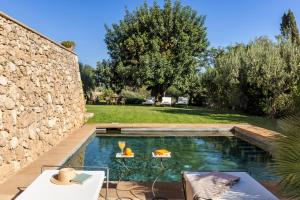 Бассейн в Masseria Costanza Vendicari или поблизости