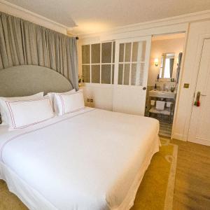 Postel nebo postele na pokoji v ubytování Magda Boutique Rooms