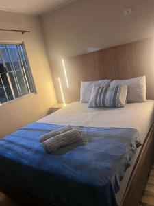 Postel nebo postele na pokoji v ubytování Casa Av parana
