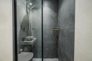 Koupelna v ubytování Pontikonisi Hotel & Suites