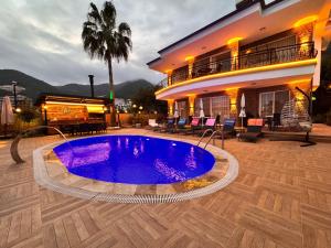 Bazén v ubytování alanya polat holiday village nebo v jeho okolí