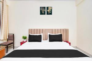 Voodi või voodid majutusasutuse Hotel O YATRA INN toas