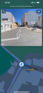 a screenshot of a street with a car on the road at Marroquia in Loulé