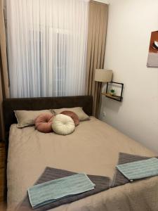 Postel nebo postele na pokoji v ubytování Apartman Golden Crown