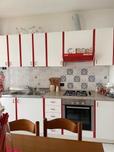 Η κουζίνα ή μικρή κουζίνα στο Casa Orchidea +15 φωτογραφίες