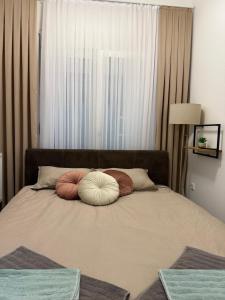 Postel nebo postele na pokoji v ubytování Apartman Golden Crown