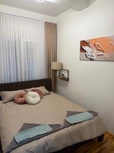 Postel nebo postele na pokoji v ubytování Apartman Golden Crown
