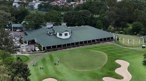 an aerial view of a house with a golf course at Colombo Green Heaven in Cotta Road Railroad Station
